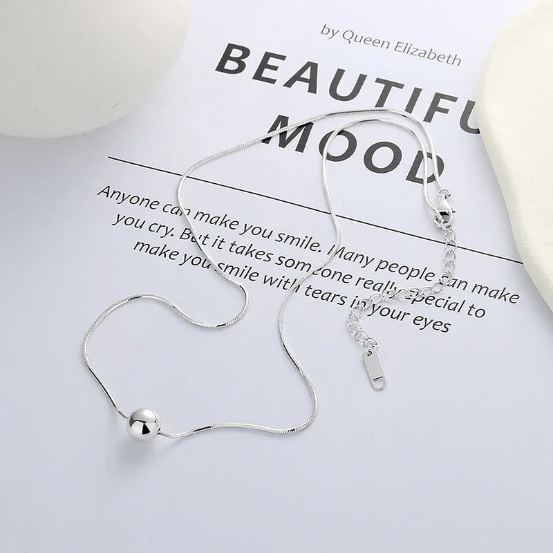 Small ball pendant on delicate 925 silver clavicle necklace with round YFL376 design