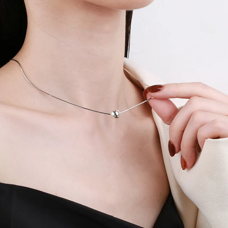 Small ball pendant on delicate 925 silver clavicle necklace with round YFL376 design