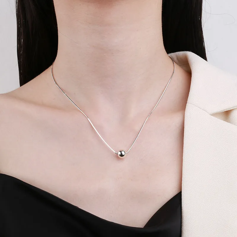 Small ball pendant on delicate 925 silver clavicle necklace with round YFL376 design