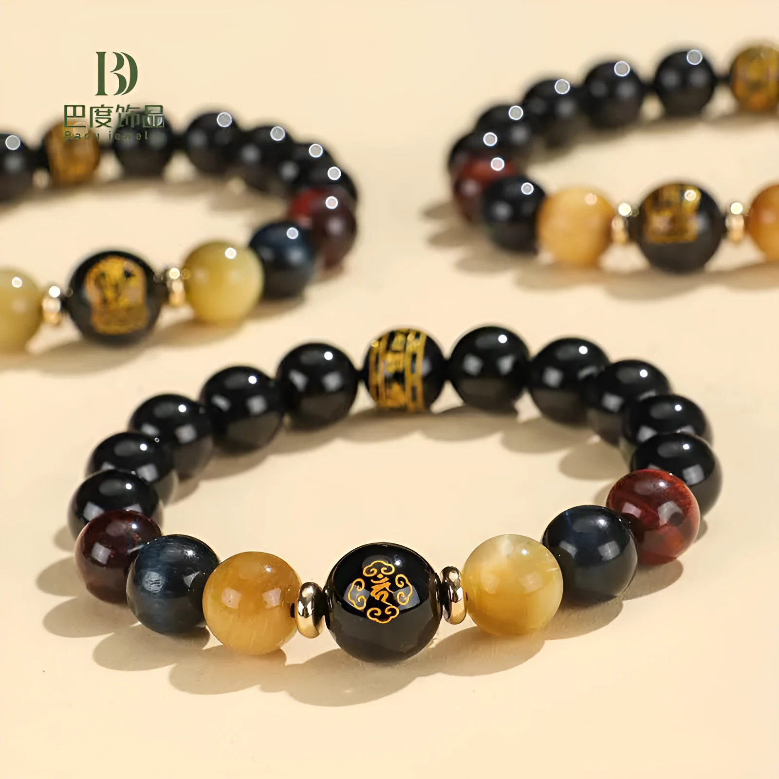 Manually crafted black agate beaded bracelet with gold, blue, and red tiger eye stones, showing ethnic zodiac design.