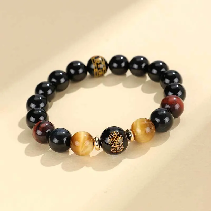 Manually crafted black agate beaded bracelet with gold, blue, and red tiger eye stones, showing ethnic zodiac design.