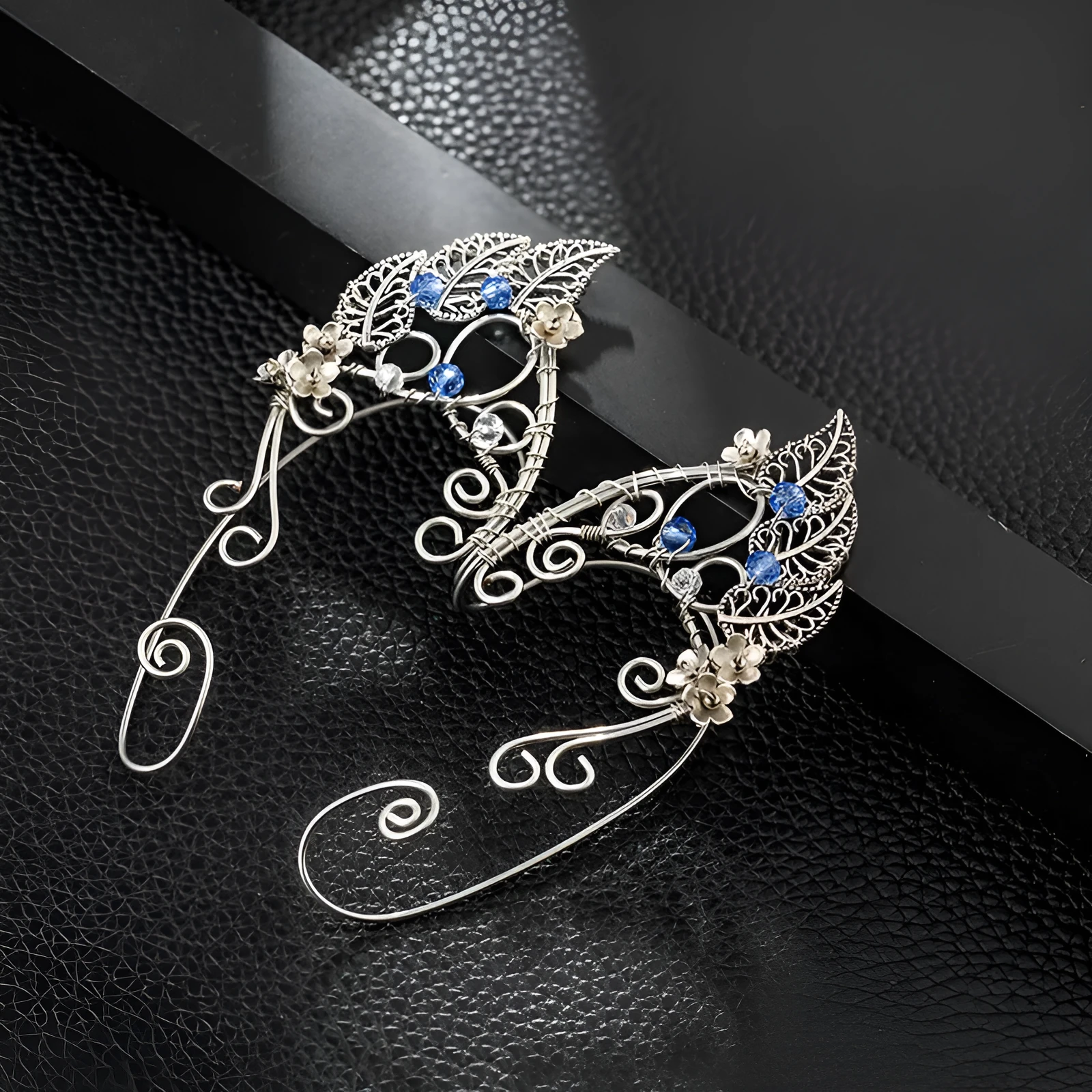 Handmade leaf shaped elf ear clip in gold pair with electroplated finish on woman