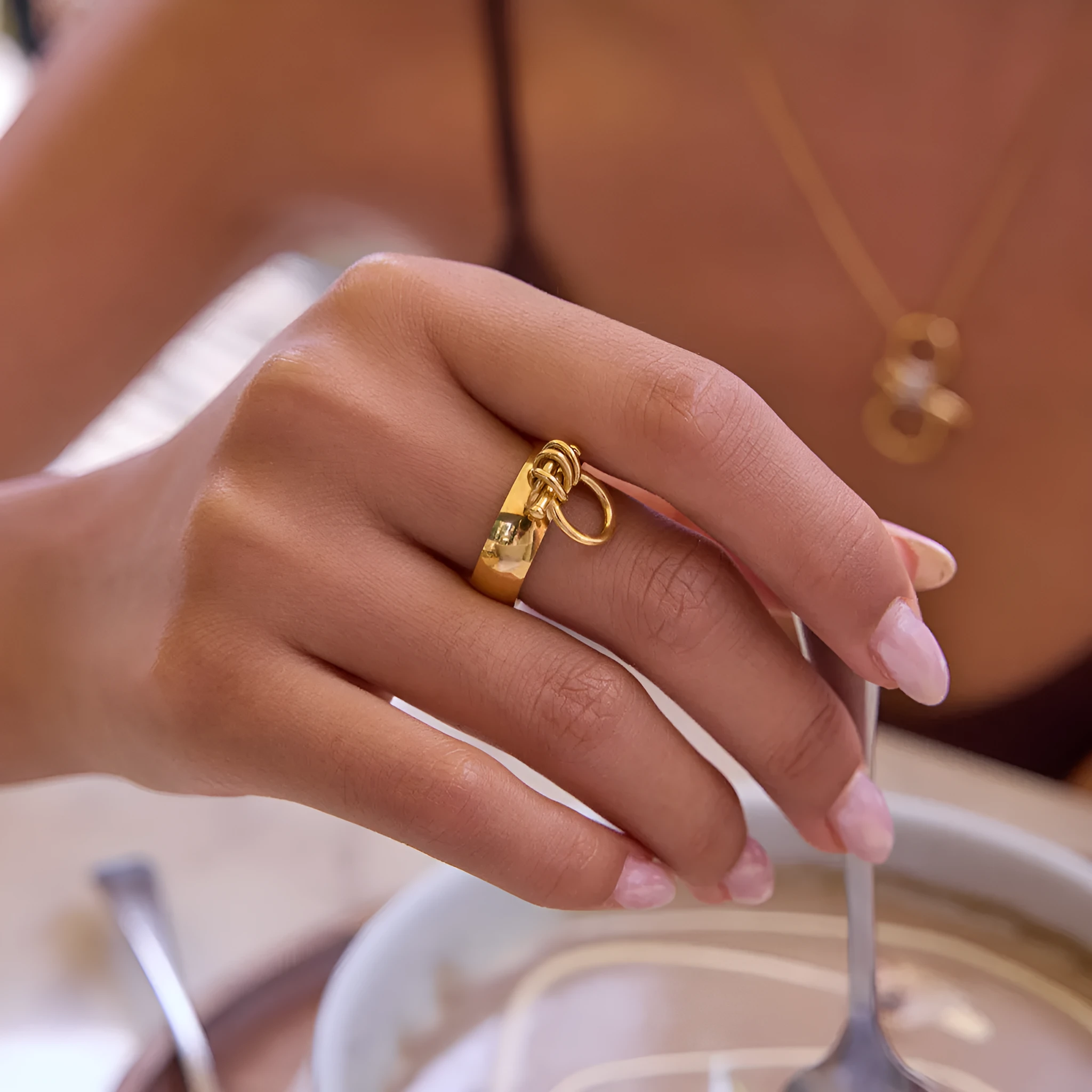 18K gold stainless steel women's open ring with geometric horseshoe motif on a titanium steel band