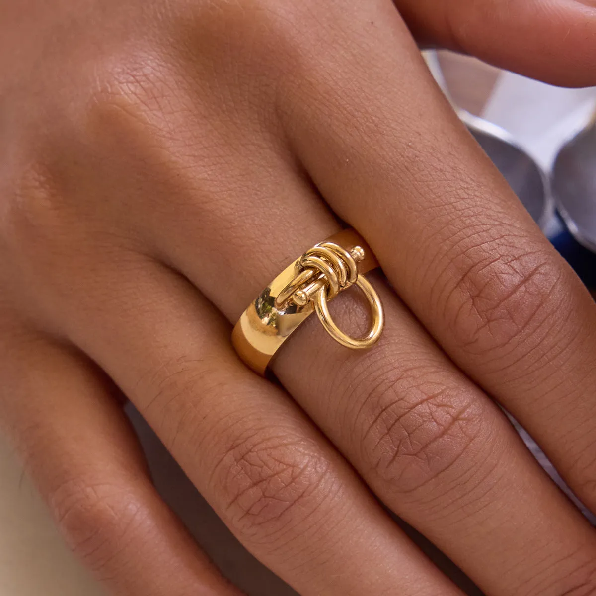18K gold stainless steel women's open ring with geometric horseshoe motif on a titanium steel band