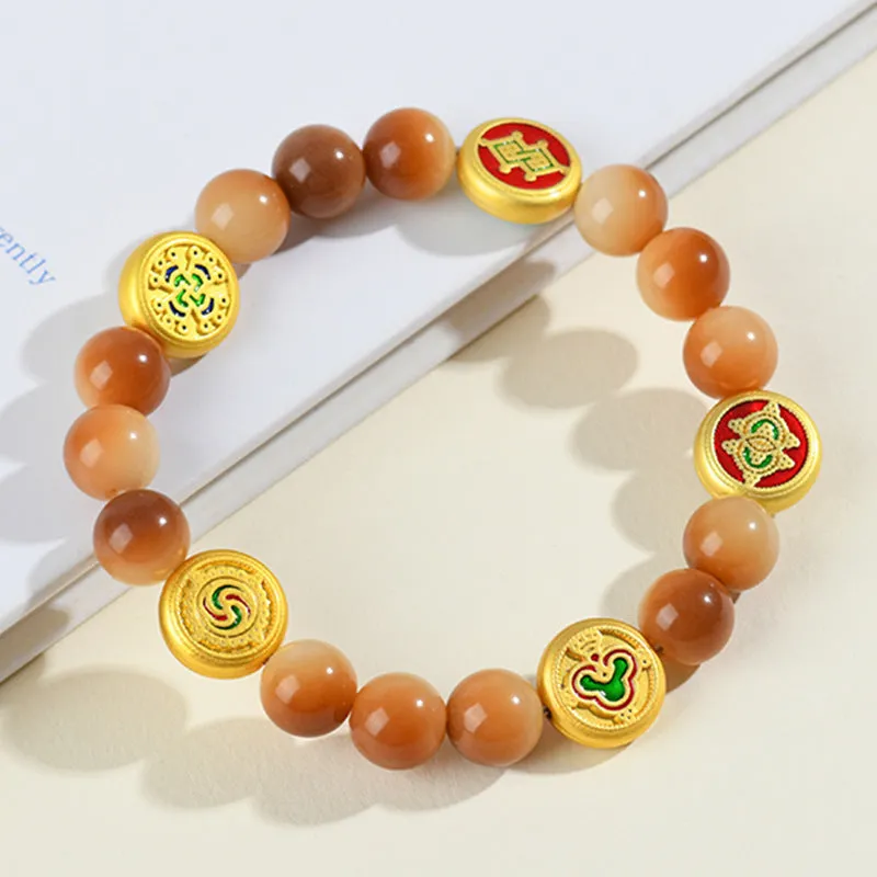 Yellow Bodhi seed bracelet showing five directions geometric design with round beads