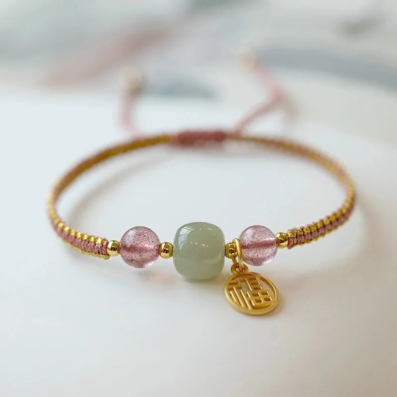 Adjustable red rope bracelet with strawberry quartz beads, showcasing national style design.