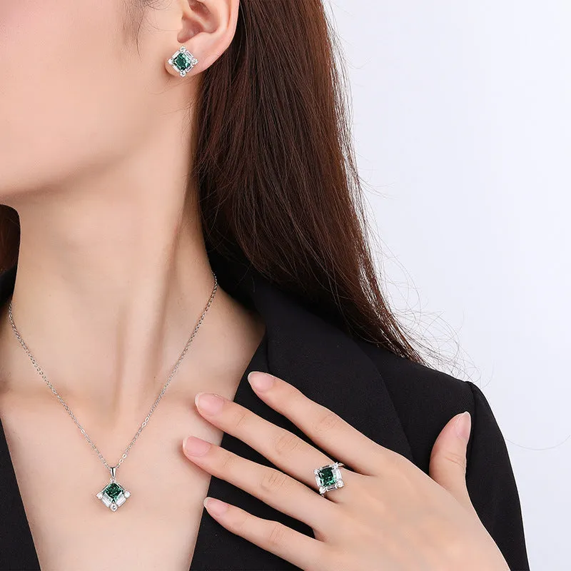 S925 silver emerald diamond jewellery set with necklace earrings and ring on display