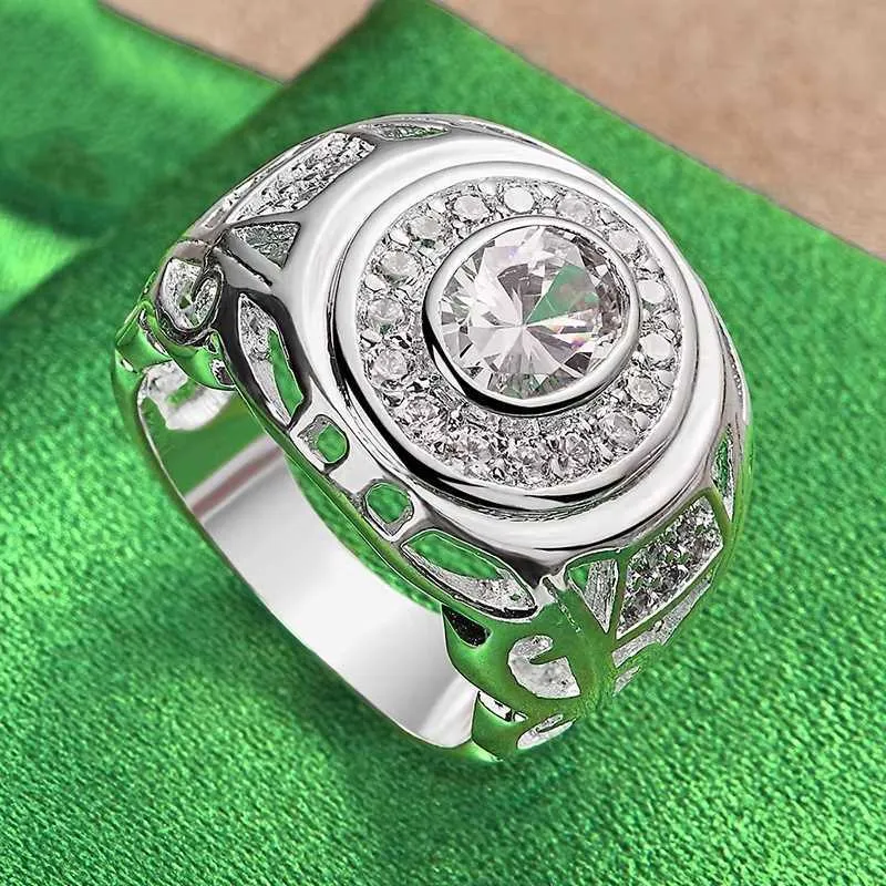 Round zircon silver electroplated copper ring on finger, available in sizes No 6 to No 10