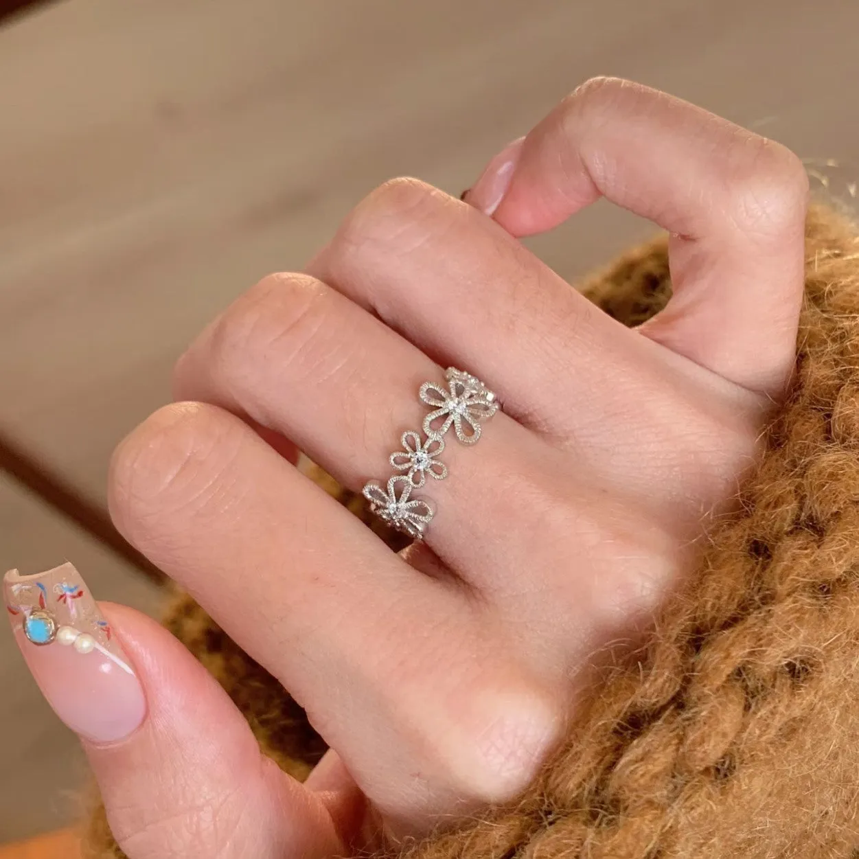 Lace hollow five petal flower ring on finger, copper electroplated finish, flower and geometric shape, women's Japan Korea style accessory