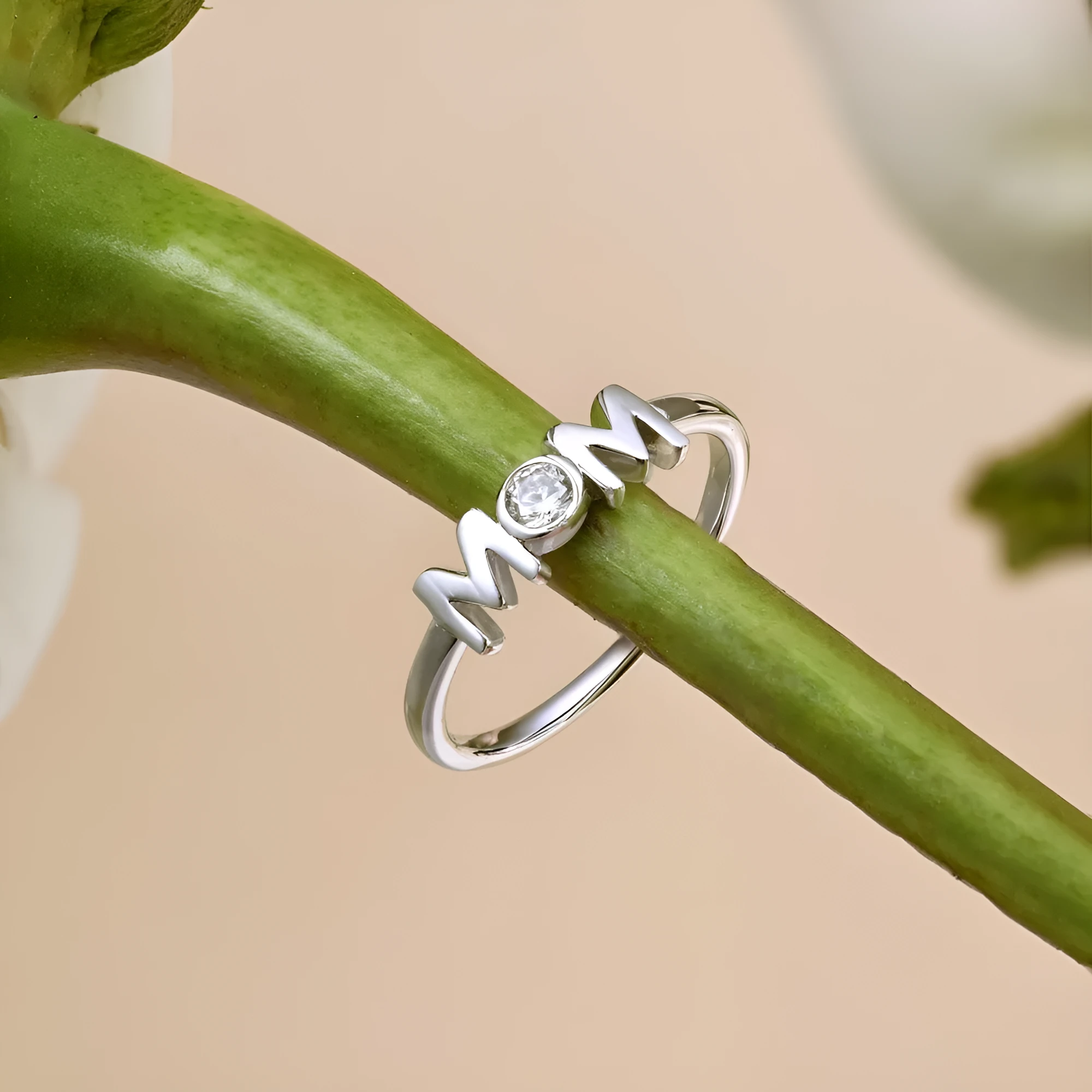 MOM Design refined simple geometric letter ring for women in silver with gold and platinum colour options