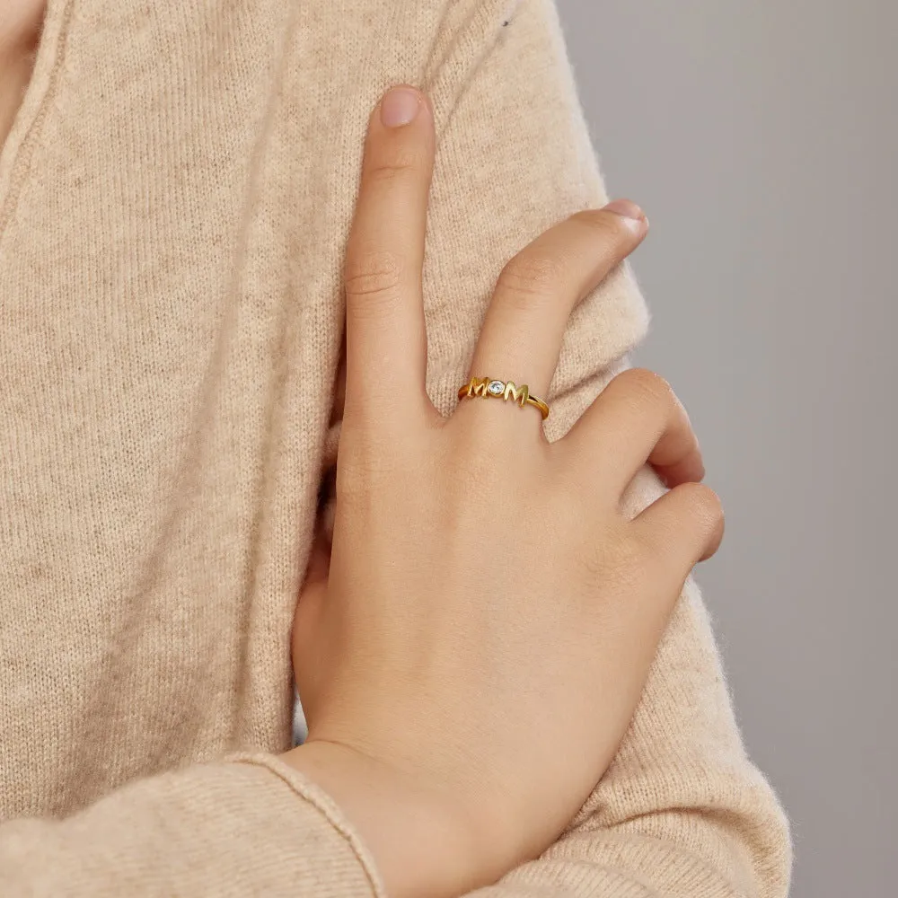 MOM Design refined simple geometric letter ring for women in silver with gold and platinum colour options