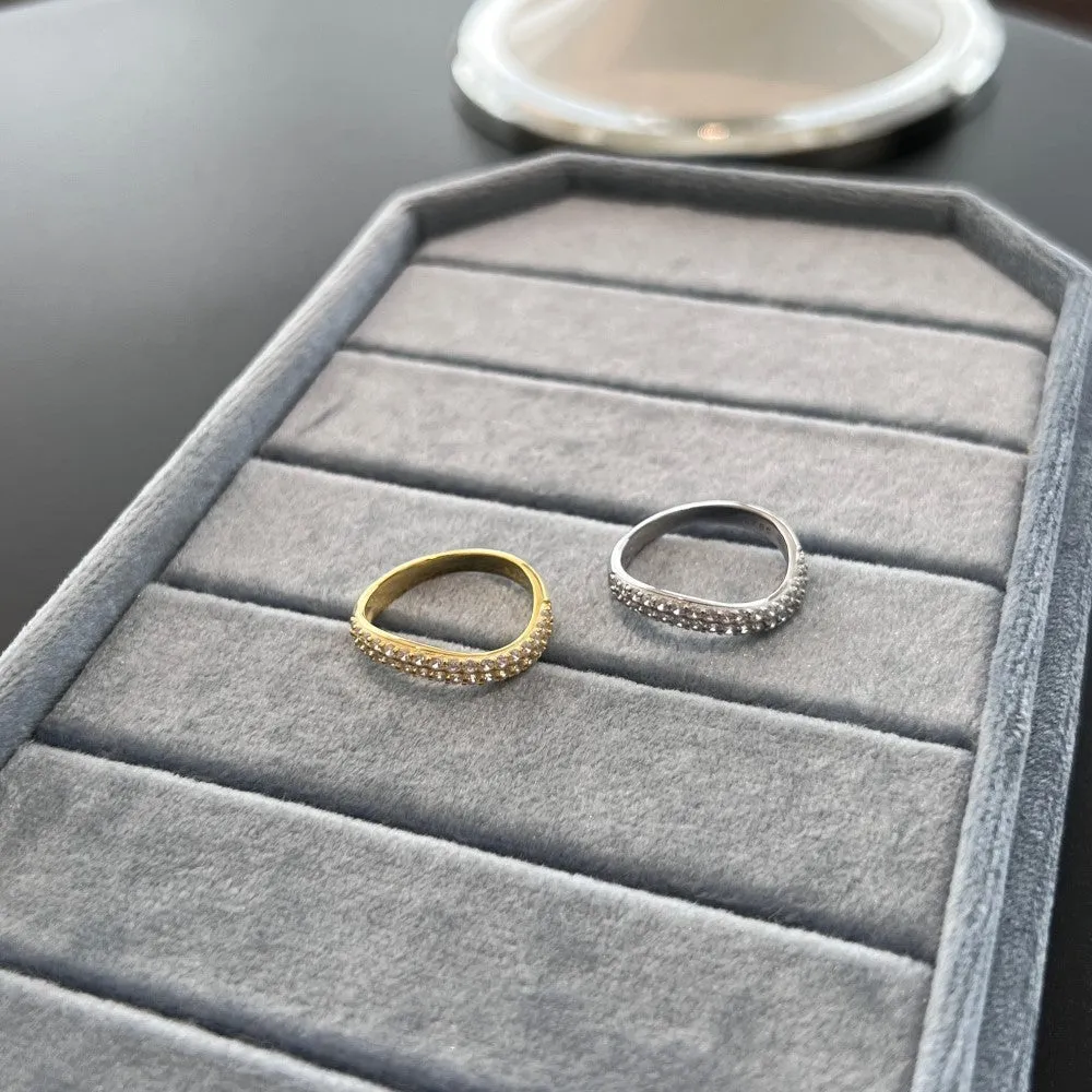 Female S925 sterling silver snake-shaped ring with zircon inlay in platinum finish on white background