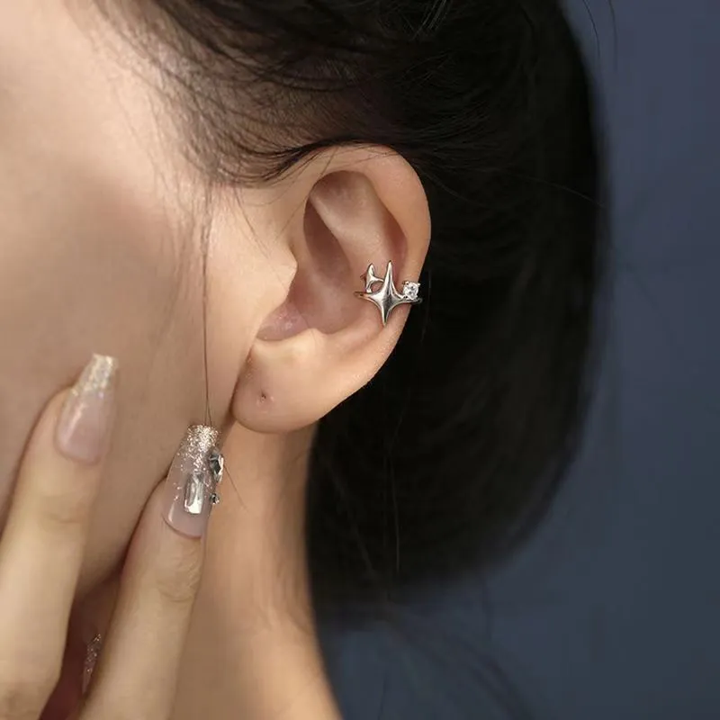 Women's retro geometric small diamond four eight-pointed stars ear clip in silver with electroplated finish