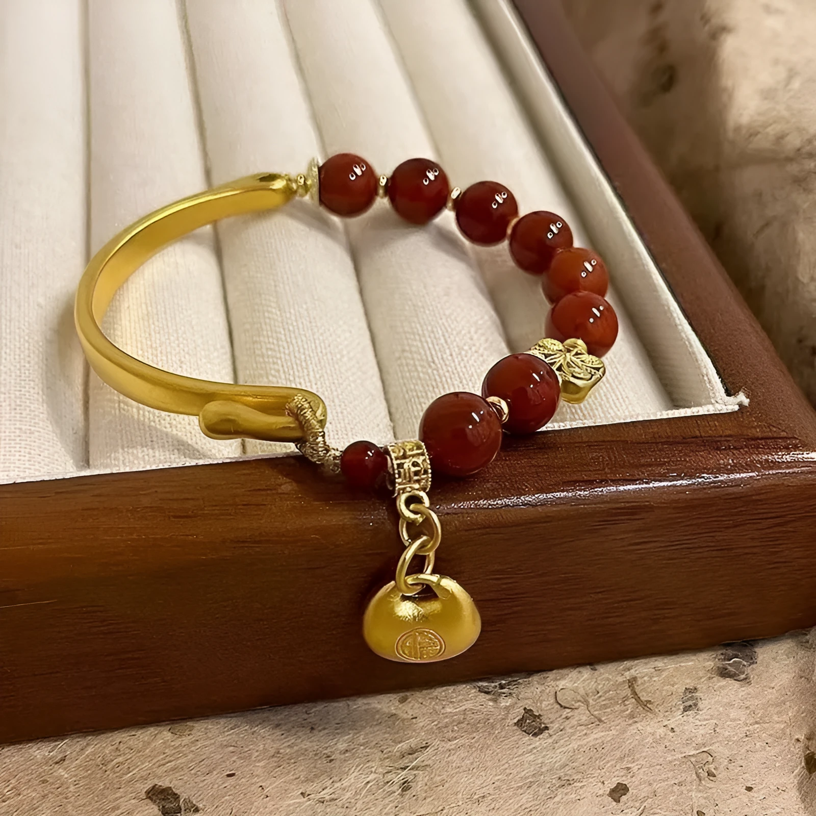 Golden south red agate character ingot women's bracelet with lucky bag design