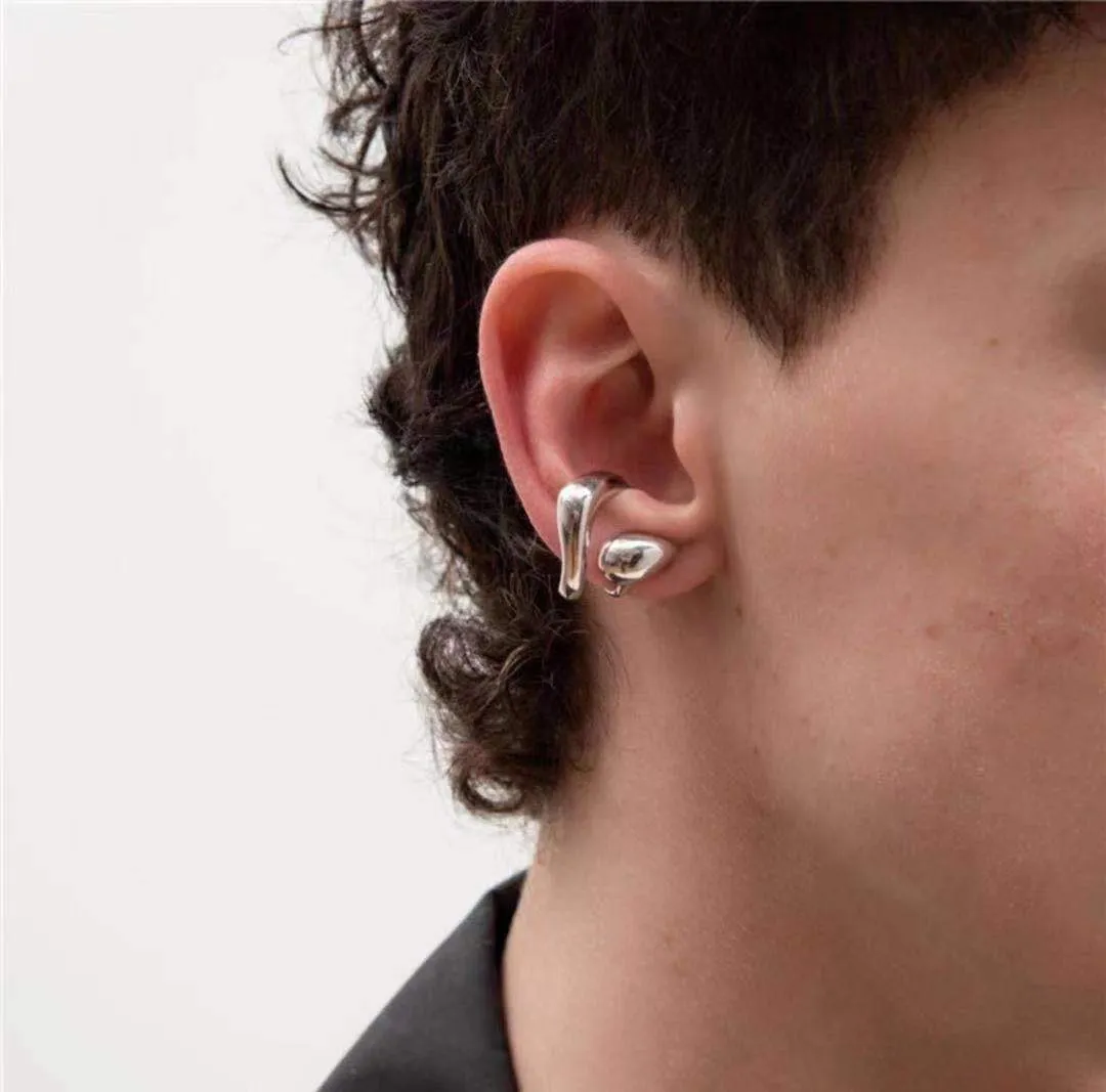 Unisex silver plated geometric earrings with Seiko treatment, shown as a pair on a neutral background