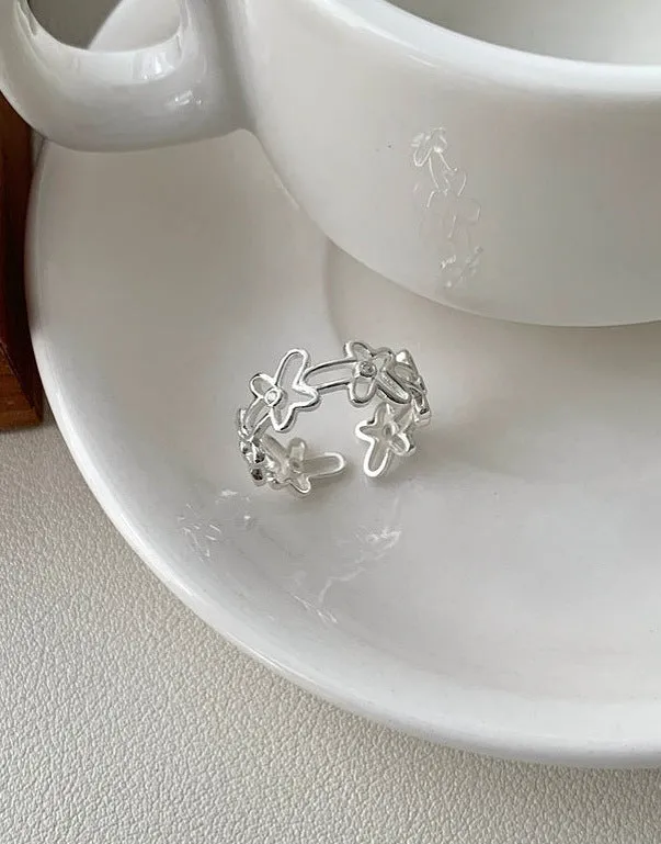 S925 sterling silver irregular hollow-out flower ring with adjustable opening in silver colour