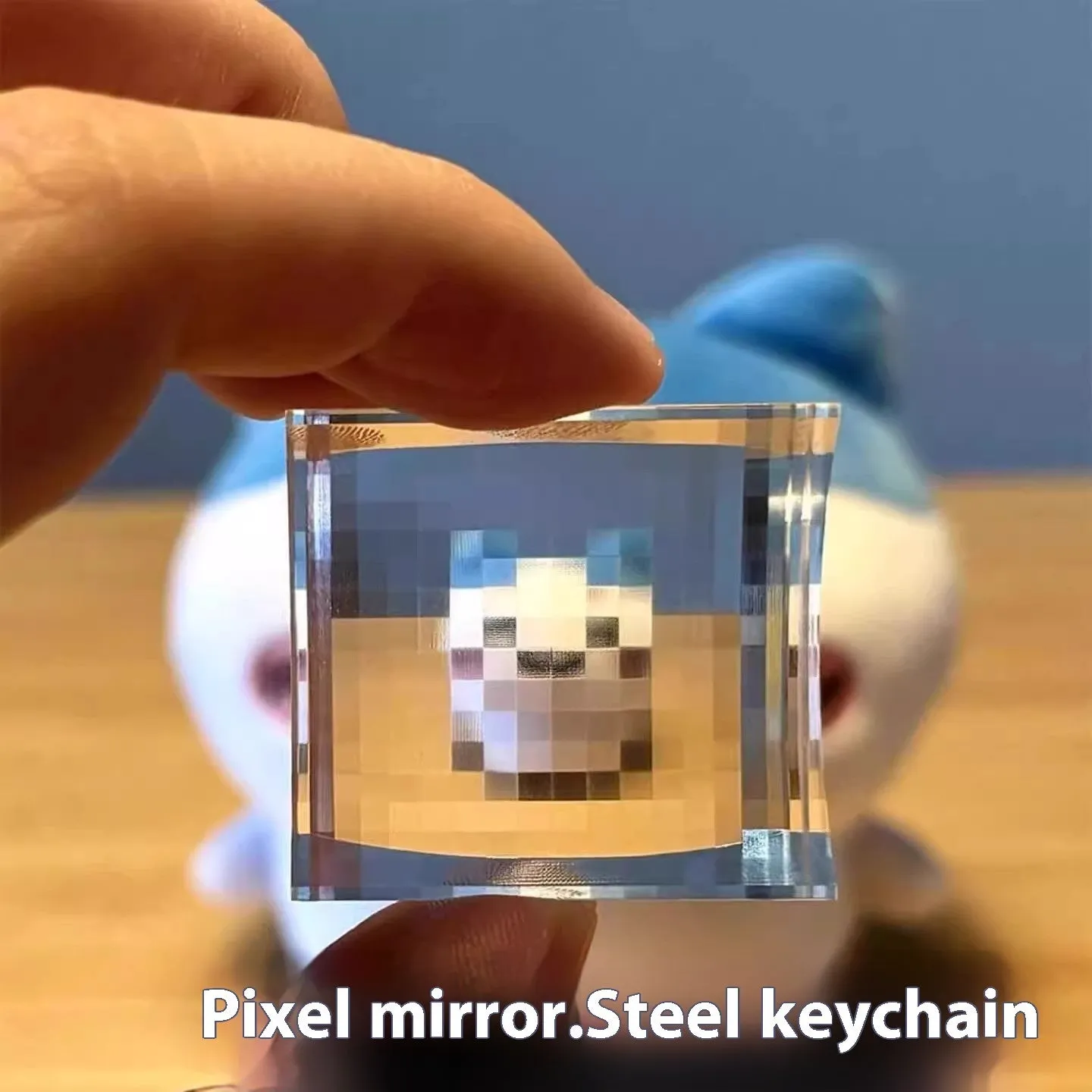Pixel Stone Mosaic Filter My World keychain in acrylic, available in black, blue, and pink colour options