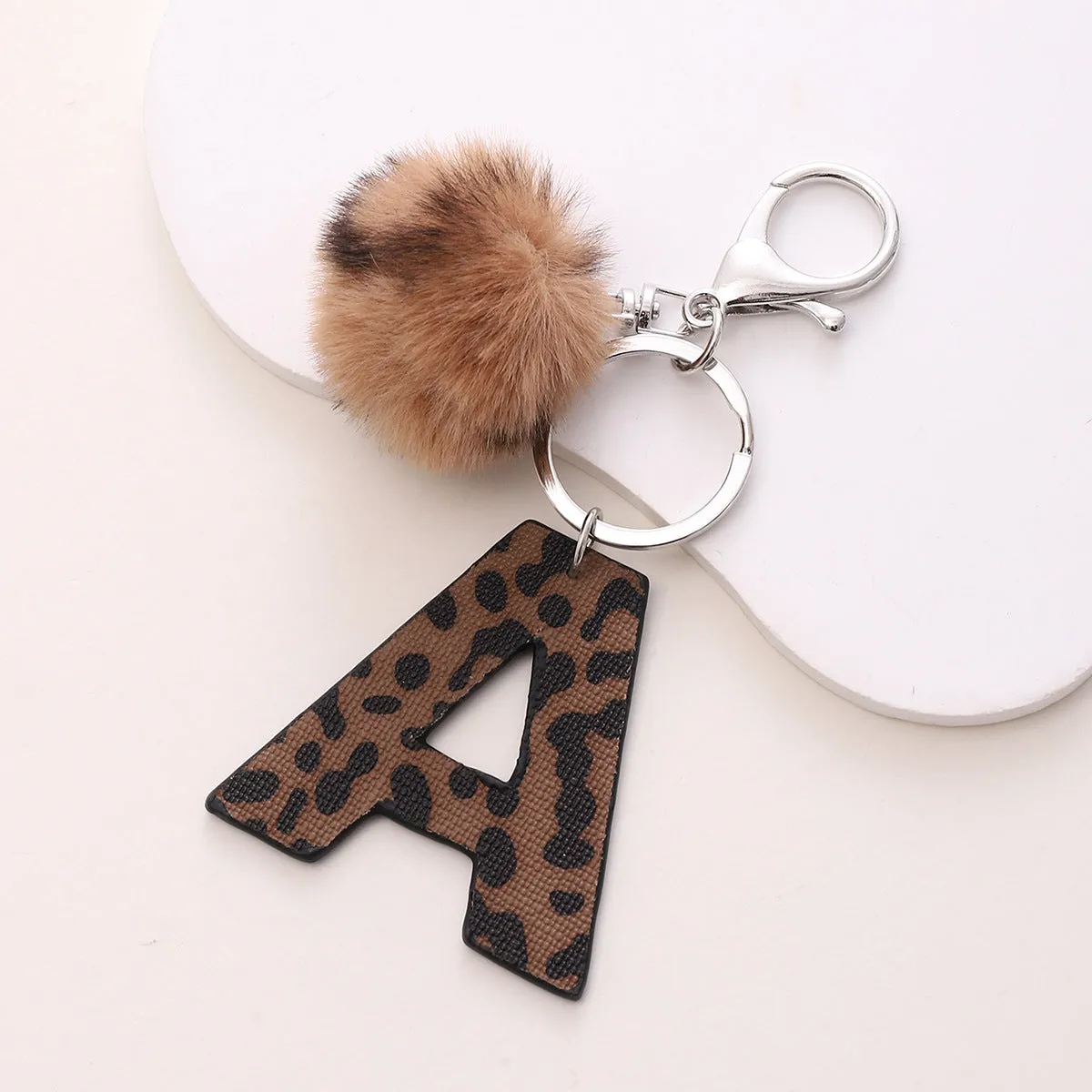 Retro leopard-print oil-edged letter acrylic keychain on artificial leather strap with metal keyring