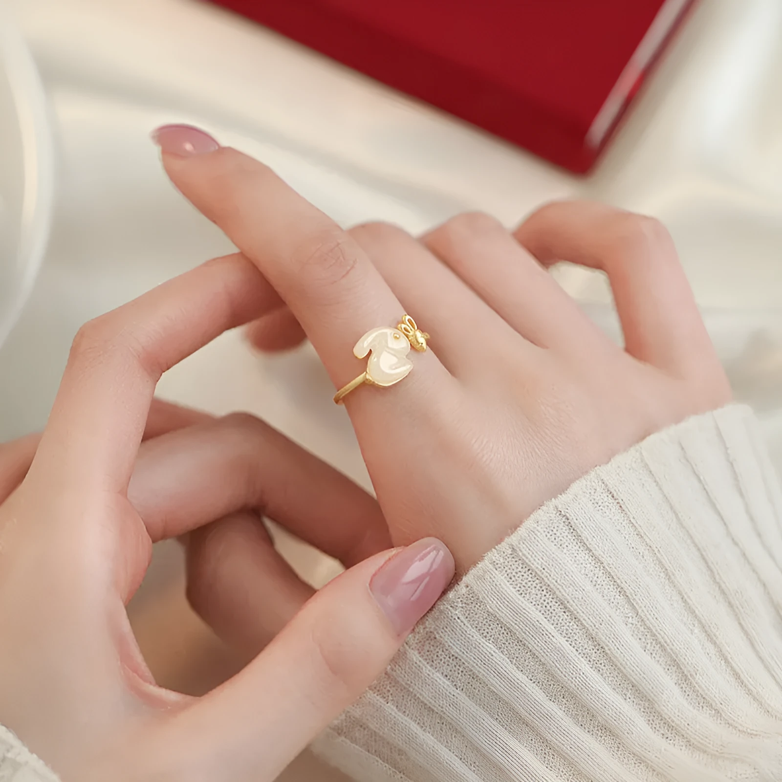 925 sterling silver jade hare ring with round shape and adjustable opening on white background