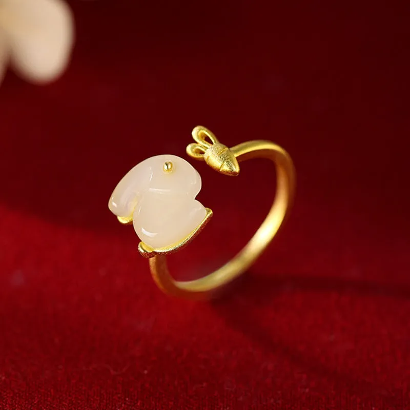 925 sterling silver jade hare ring with round shape and adjustable opening on white background