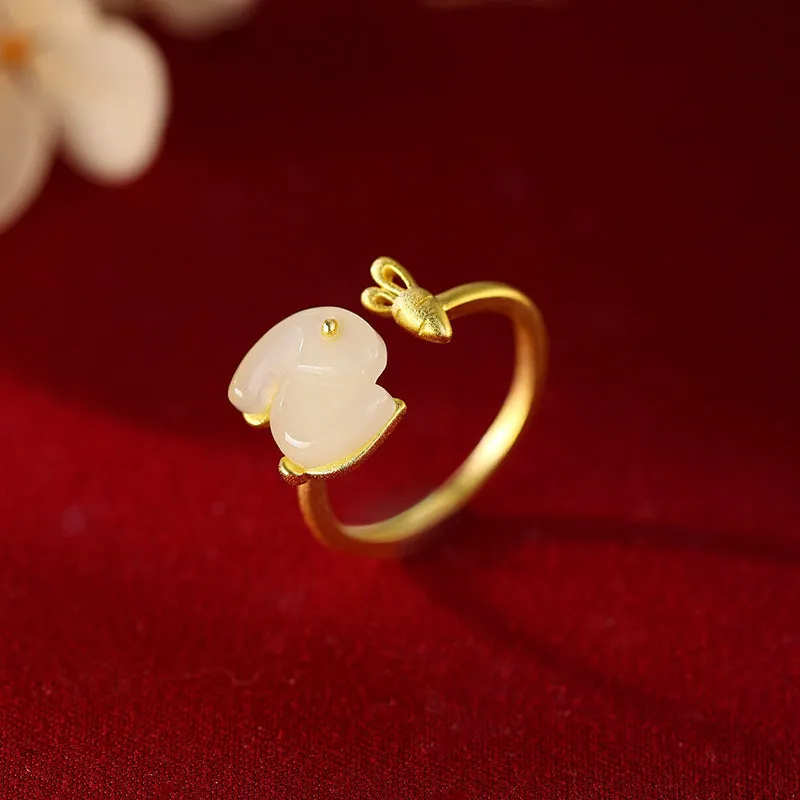 925 sterling silver jade hare ring with round shape and adjustable opening on white background