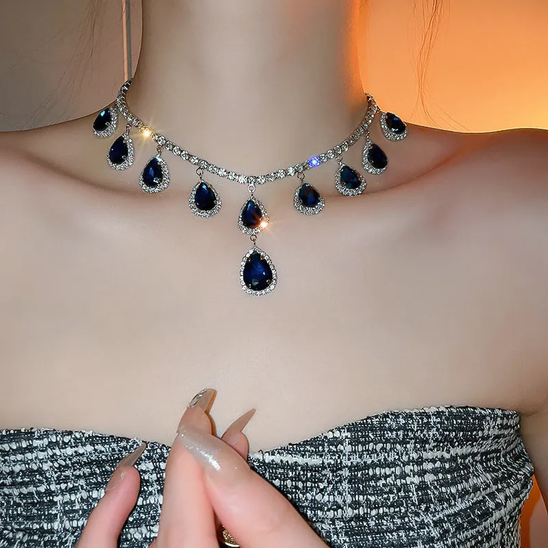 Silver needle water drop earrings and necklace set with blue zircon pendant on clavicle chain court style
