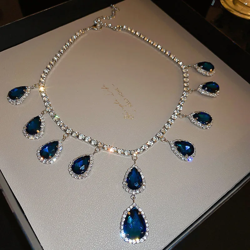 Silver needle water drop earrings and necklace set with blue zircon pendant on clavicle chain court style