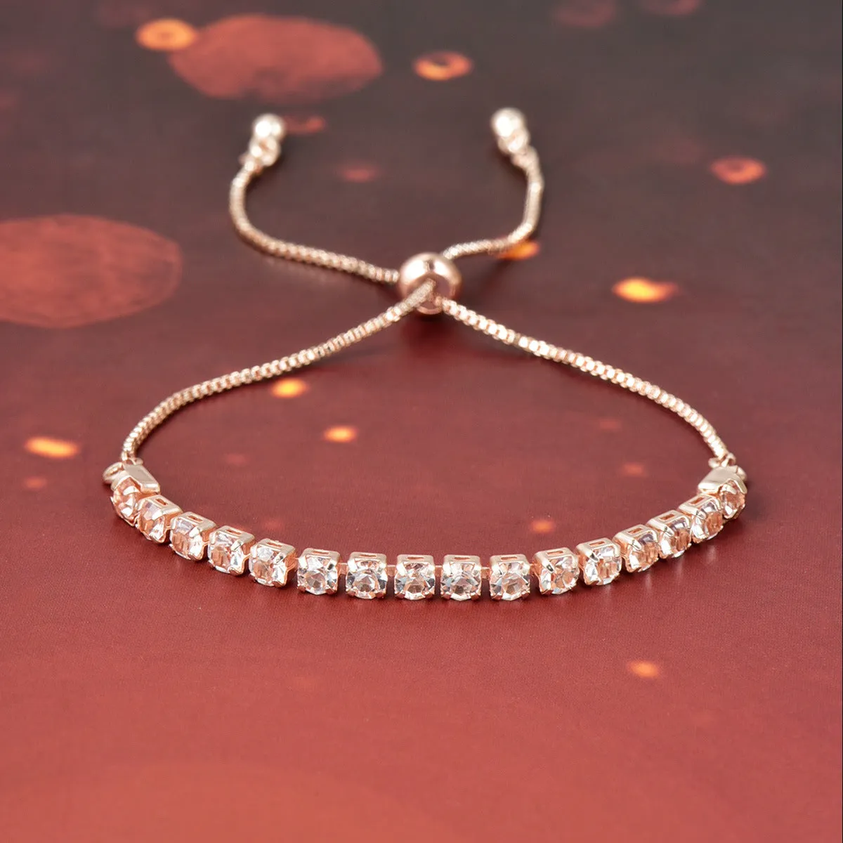 Micro-studded claw chain simple bracelet in metallic finish with round geometric studs on unisex wrist
