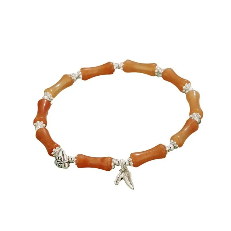 Green aventurine bamboo strawberry crystal bracelet with mixed stones and adjustable sizing
