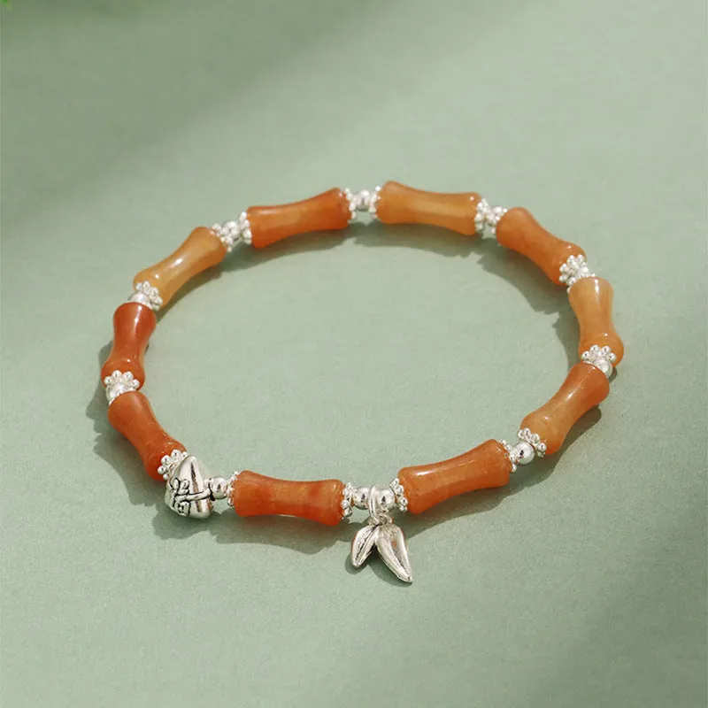 Green aventurine bamboo strawberry crystal bracelet with mixed stones and adjustable sizing