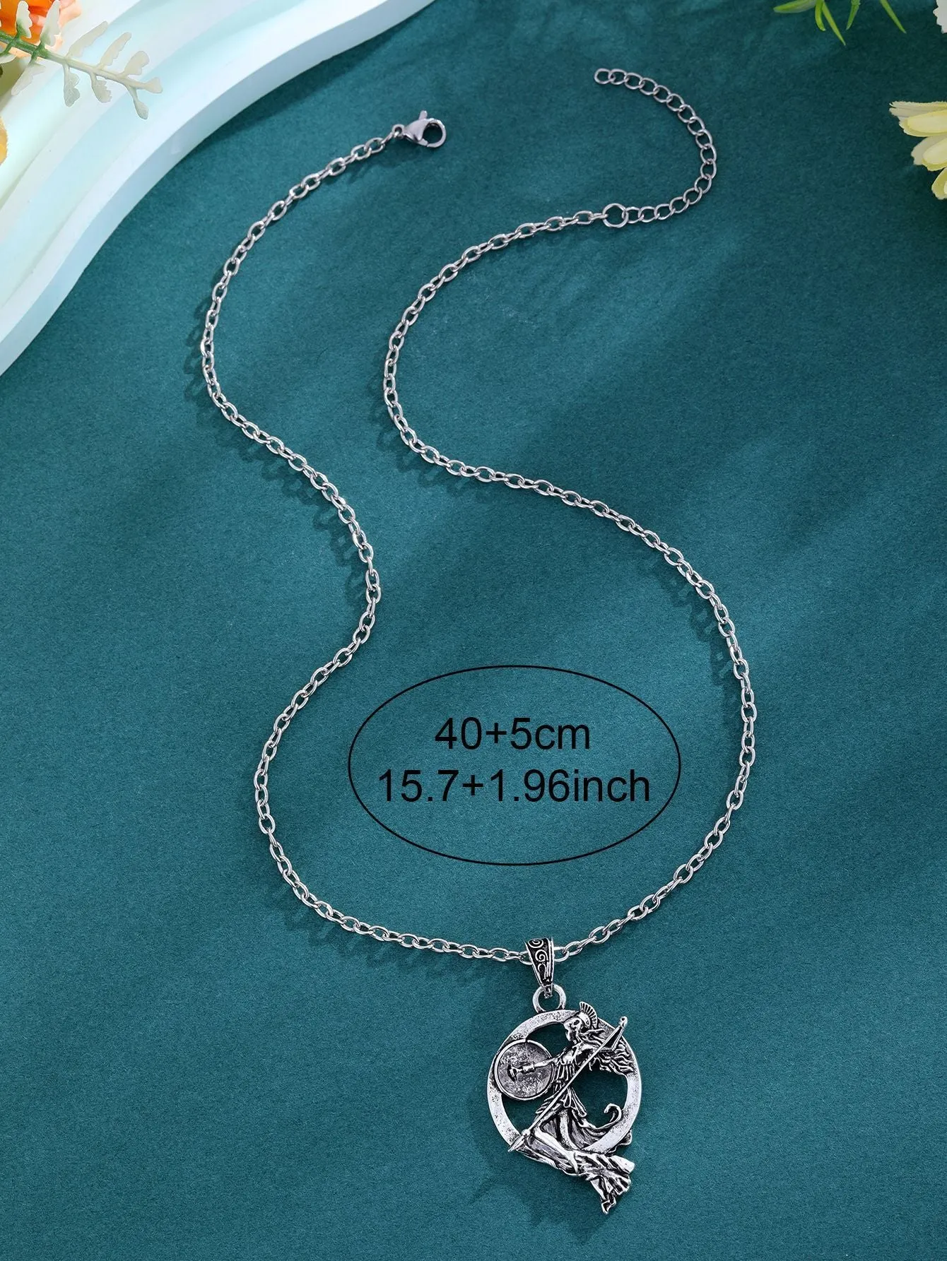 War Goddess Accessories gold-tone retro fashion necklace with warrior goddess pendant on a woman
