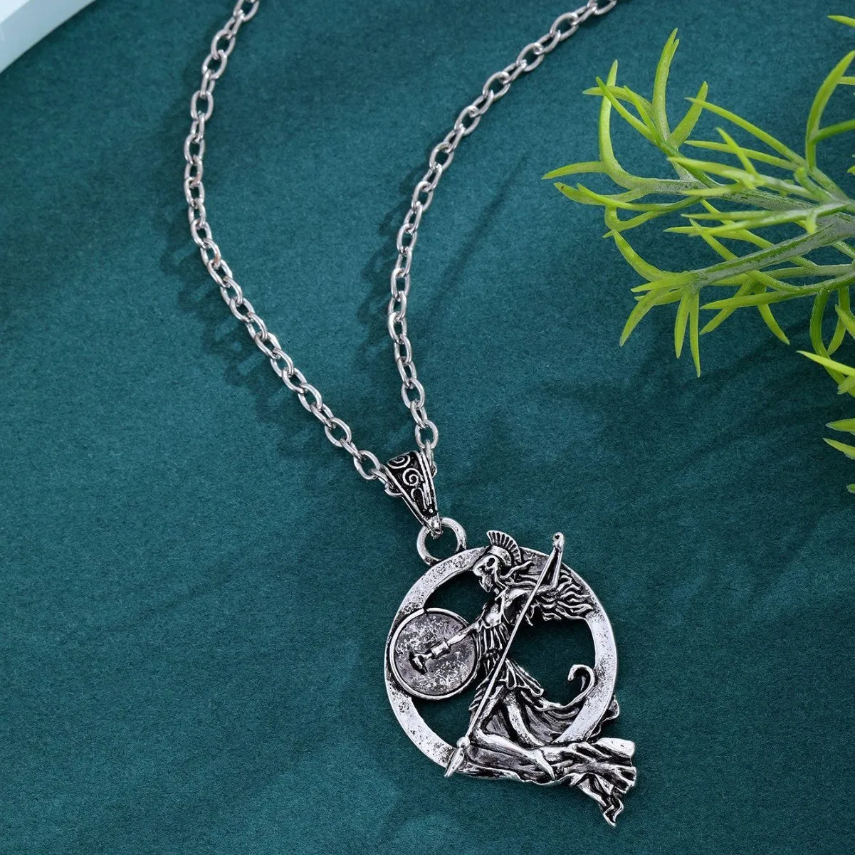 War Goddess Accessories gold-tone retro fashion necklace with warrior goddess pendant on a woman