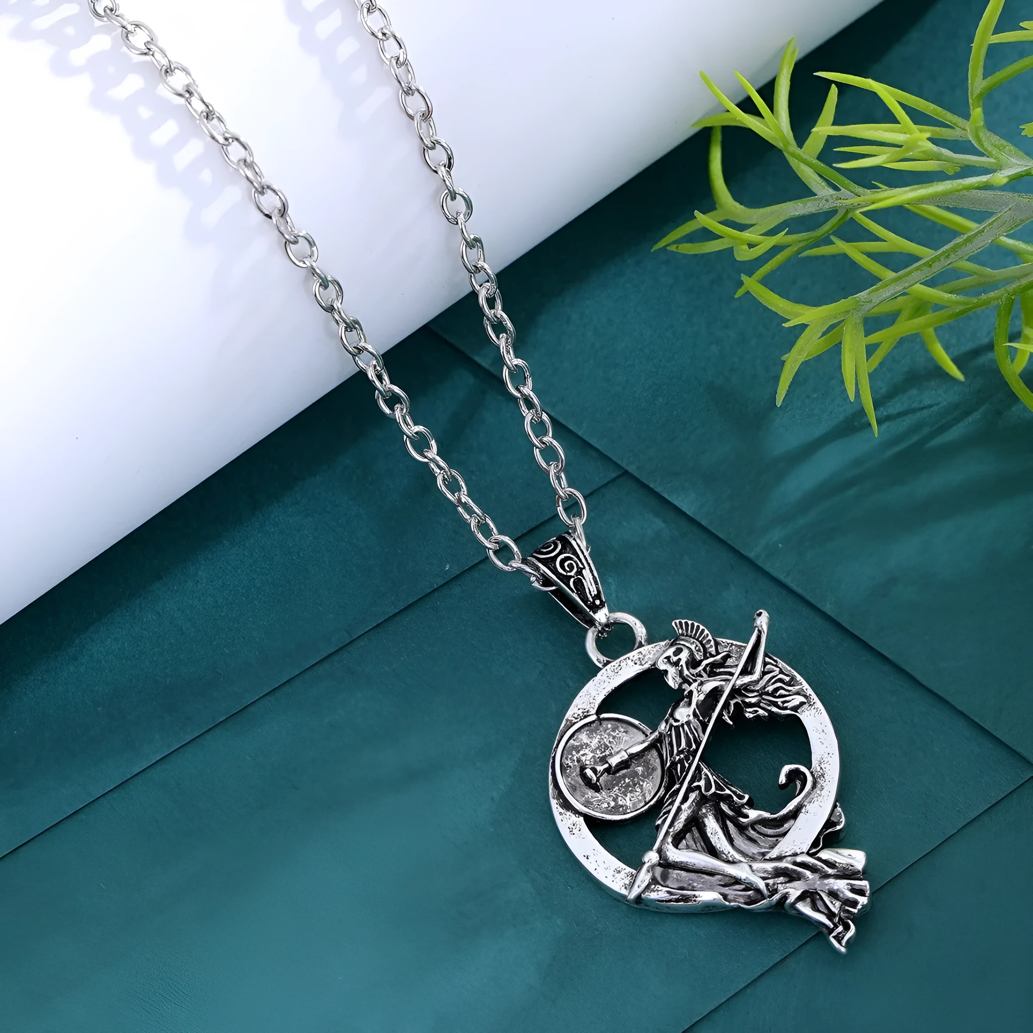 War Goddess Accessories gold-tone retro fashion necklace with warrior goddess pendant on a woman