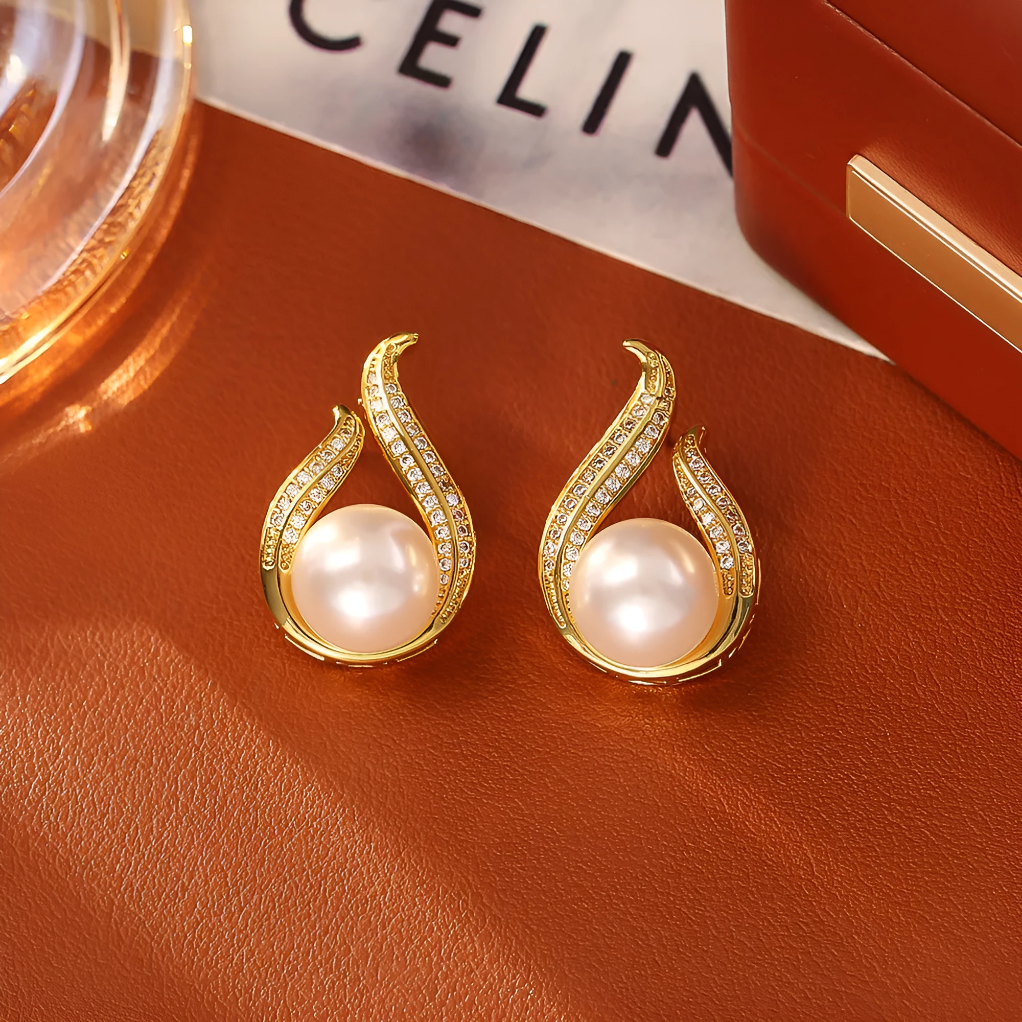 Glass pearl stud earrings with real gold plating on copper base, four colour options round geometric style