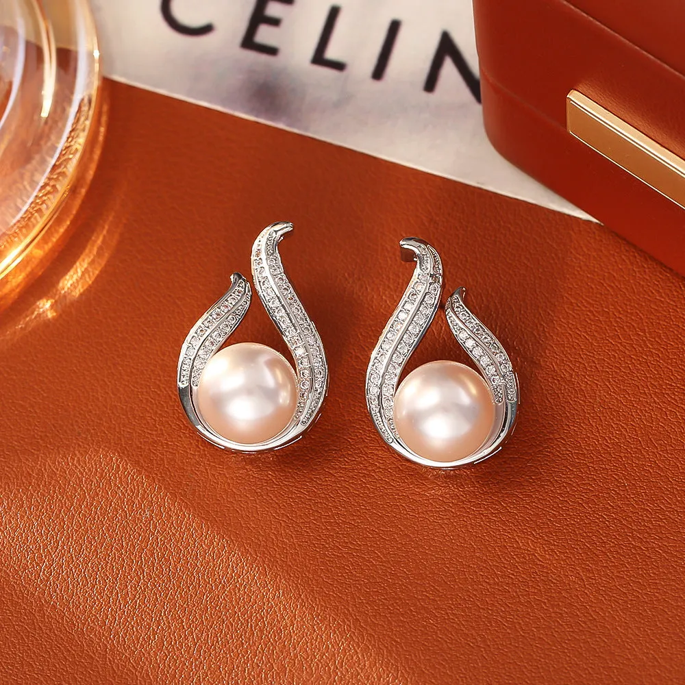 Glass pearl stud earrings with real gold plating on copper base, four colour options round geometric style