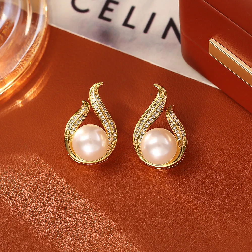 Glass pearl stud earrings with real gold plating on copper base, four colour options round geometric style