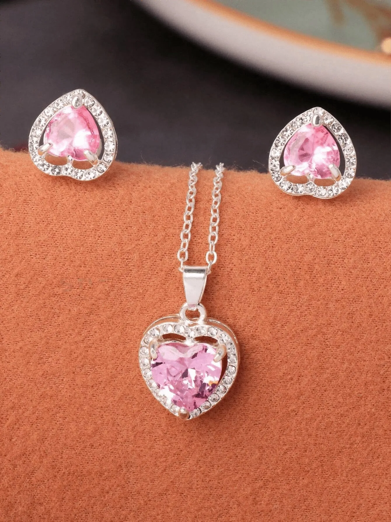 Pink crystal zircon heart-shaped pendant dangle drop earrings set on white background