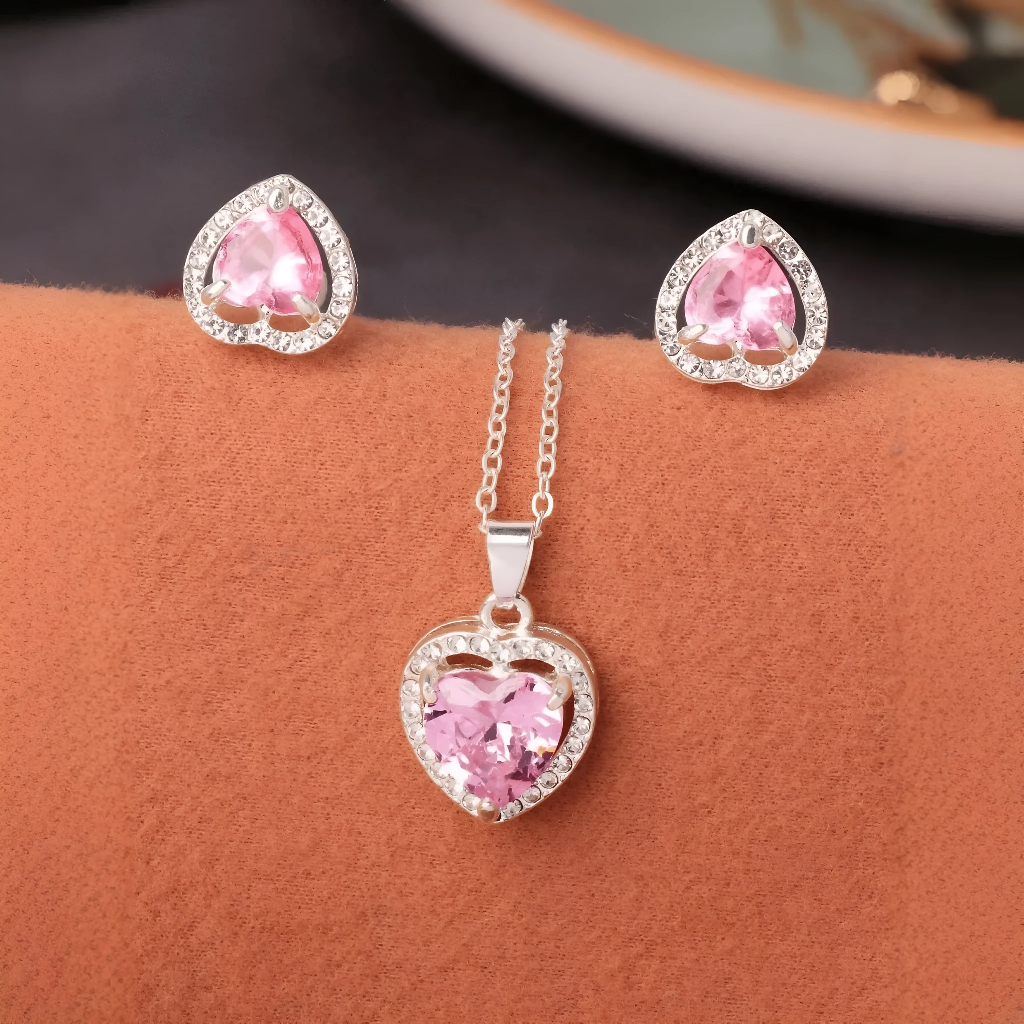 Pink crystal zircon heart-shaped pendant dangle drop earrings set on white background