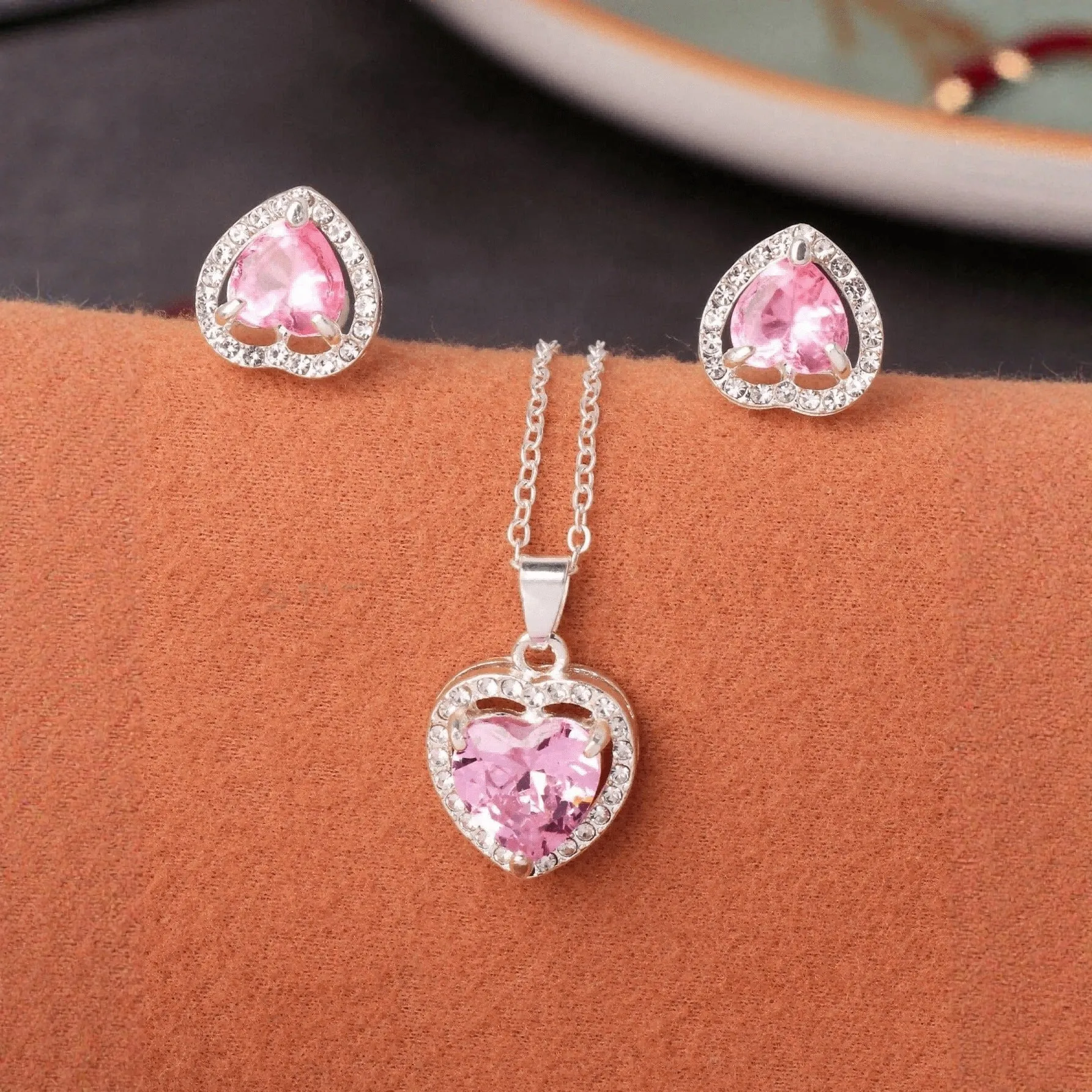 Pink crystal zircon heart-shaped pendant dangle drop earrings set on white background