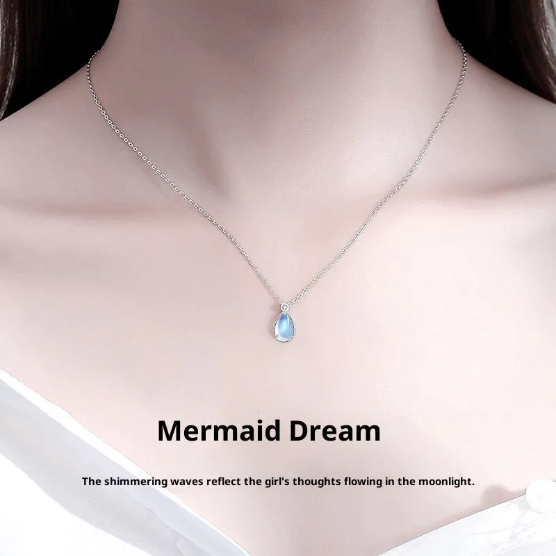 Women's 925 sterling silver moonstone necklace with adjustable chain on a neutral background