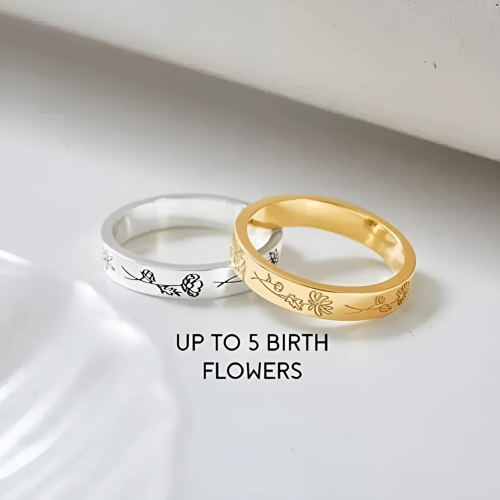 925 silver birthday flower ring with electroplated gold finish on white background