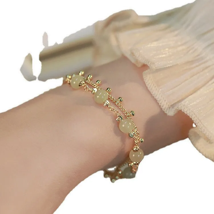 Handcrafted Hetian Jade bracelet with Princess On The Run beaded design for women