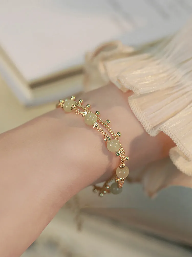 Handcrafted Hetian Jade bracelet with Princess On The Run beaded design for women
