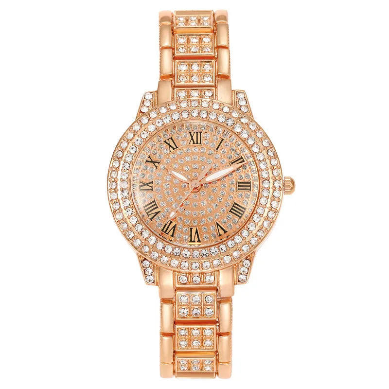 Women's starry rhinestone quartz analogue watch with gold Roman numeral dial and alloy bracelet