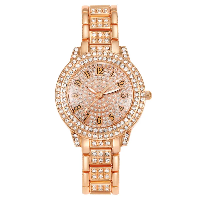 Women's starry rhinestone quartz analogue watch with gold Roman numeral dial and alloy bracelet