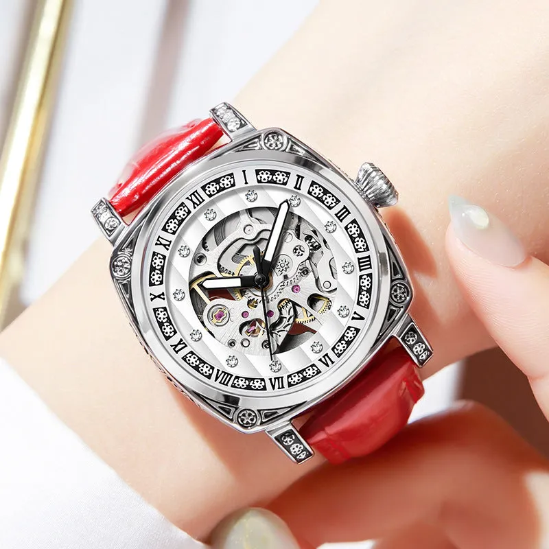 Mechanical watch with leather strap and luminous hands on a dial, shown in multiple colour options.