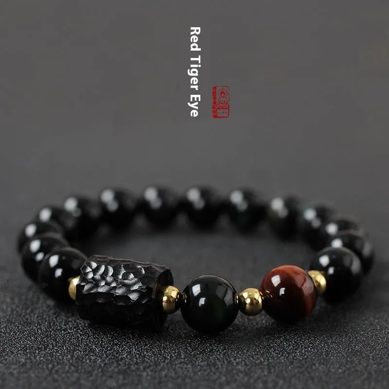 Handcrafted obsidian bracelet with 10mm yellow tiger eye beads on elastic cord