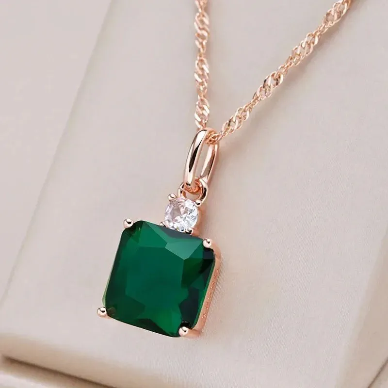 Green electroplated stainless steel clavicle chain with geometric quadrilateral pendant on O-ring chain