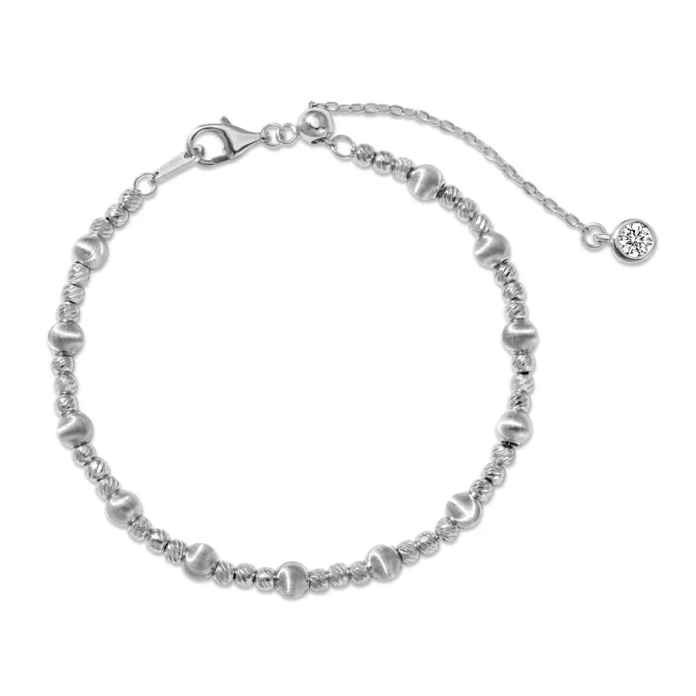 925 sterling silver cat's eye ball bracelet with carved links and brushed finish on white background