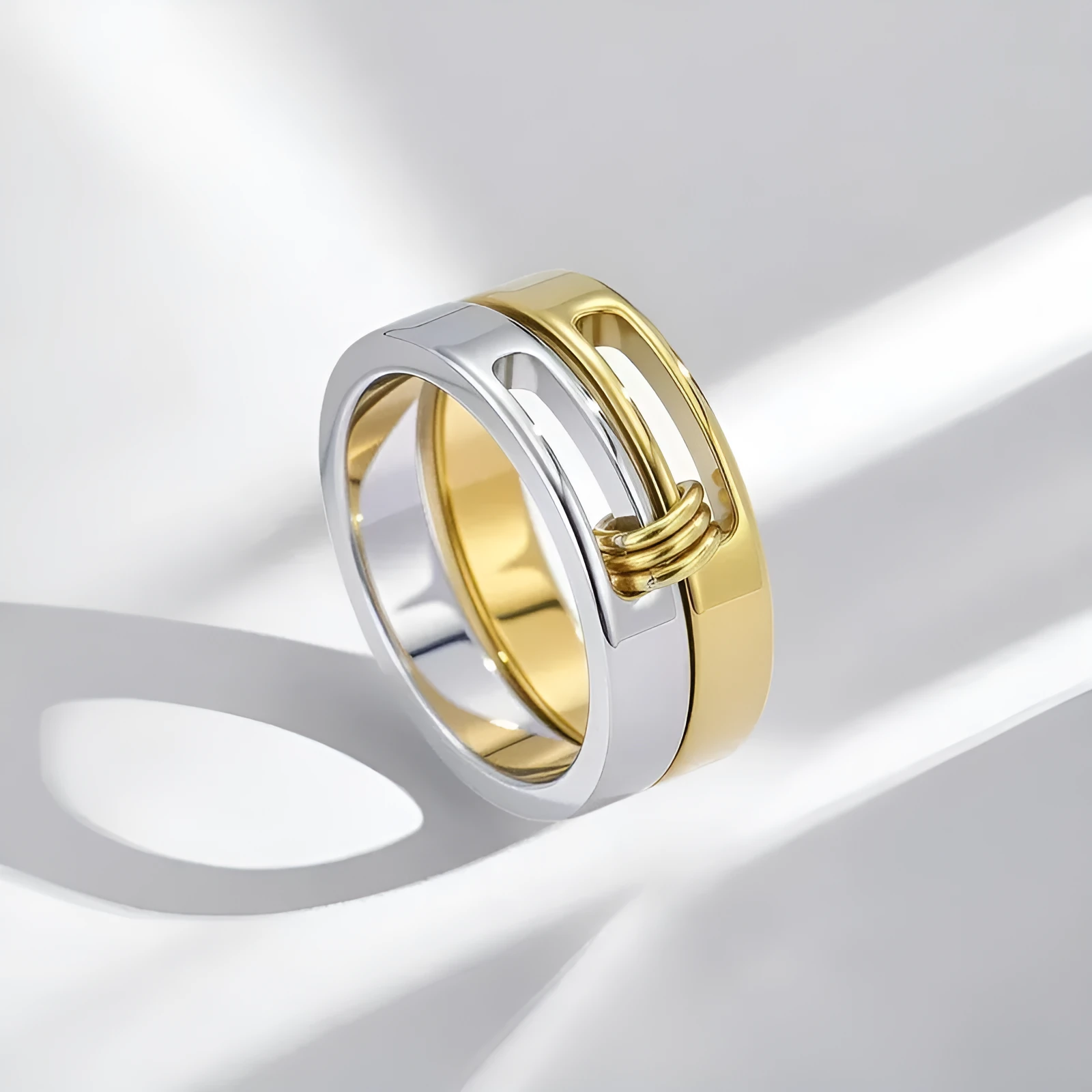 Gold electroplated double-layer twin ring on a finger, titanium steel construction, UK size options No 7 to No 9
